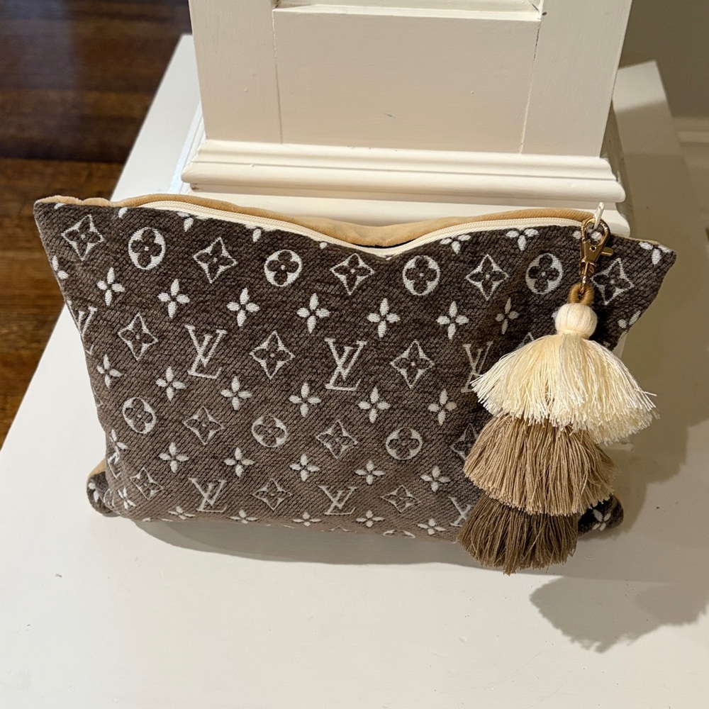 LV Zipper Pouch with tassel bag charm
